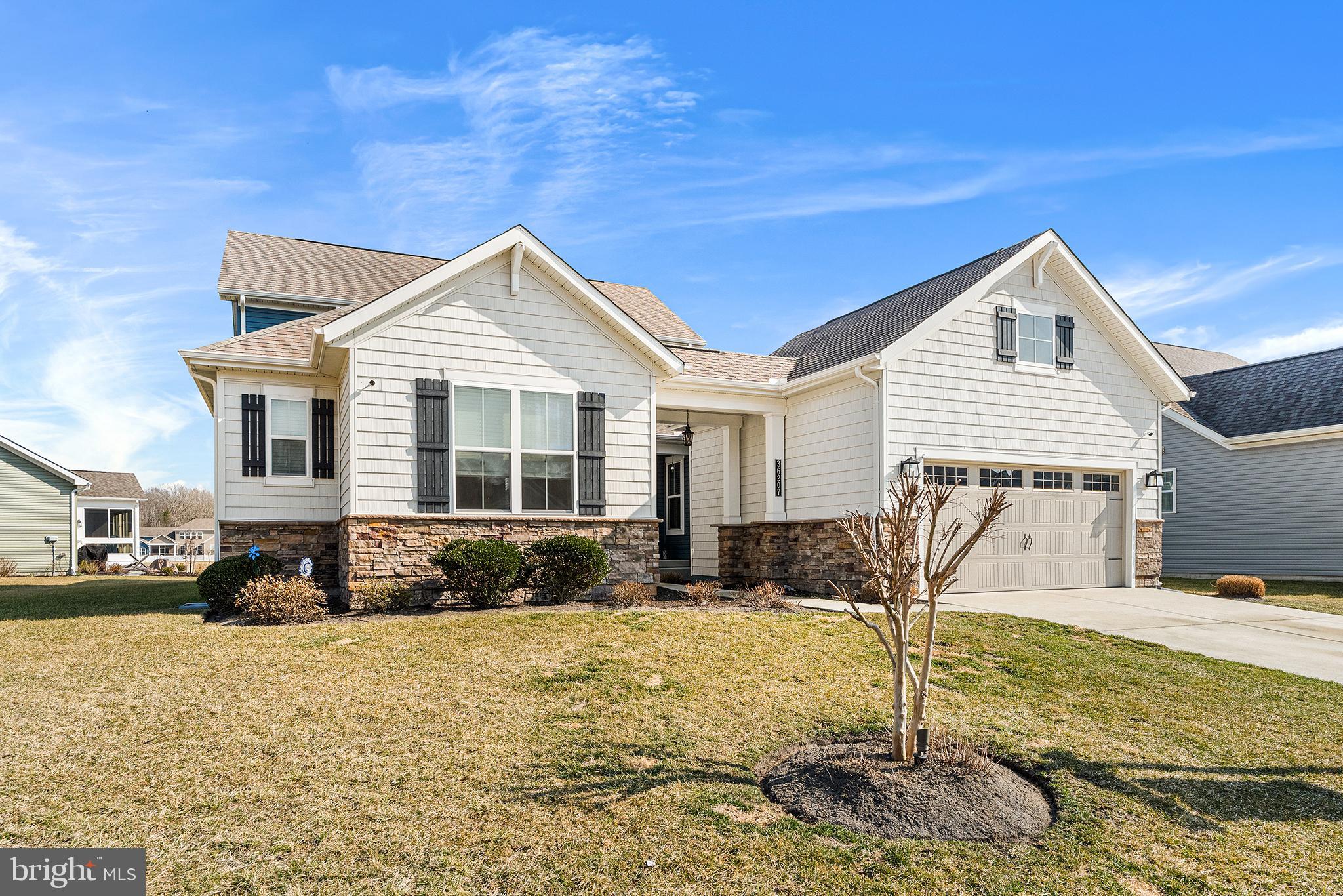 36207 Watch Hill Road Frankford, DE 19945 - Photo 3 of 35 a front view of a house with a yard