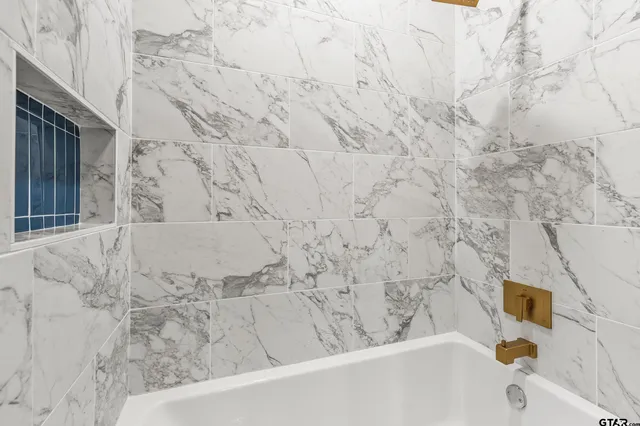 a bathroom with a bathtub