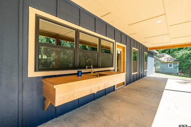 a view of an outdoor space with swimming pool