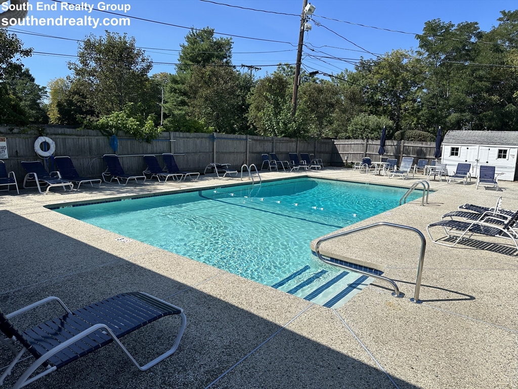 6 Whitman Road, Unit 6 Waltham, MA 02453 - Photo 12 of 12 swimming pool view with a seating space