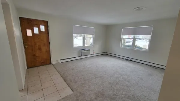 an empty room with windows