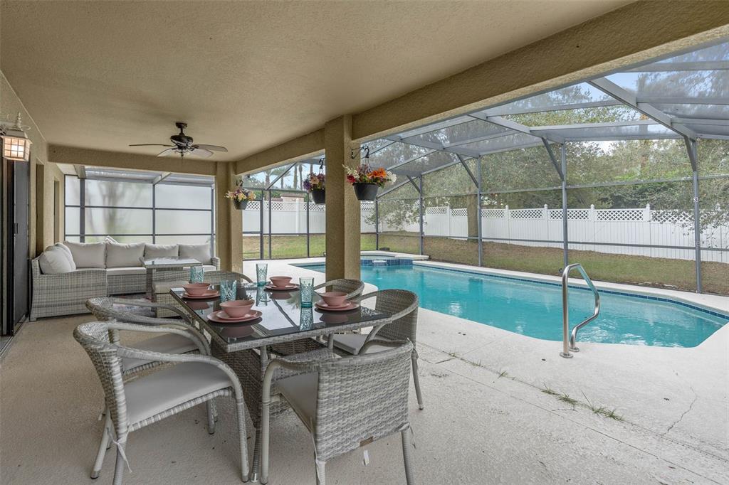 1030 Coventry Road Davenport, FL 33897 - Photo 31 of 48 a dining room with furniture and a large window