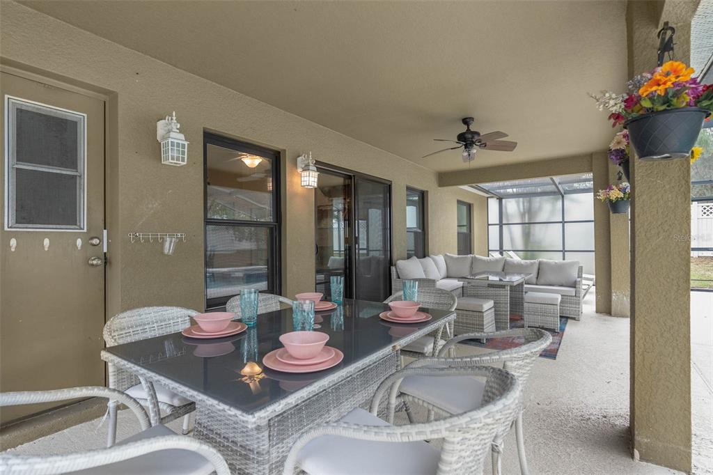 1030 Coventry Road Davenport, FL 33897 - Photo 32 of 48 a dining room with furniture and window