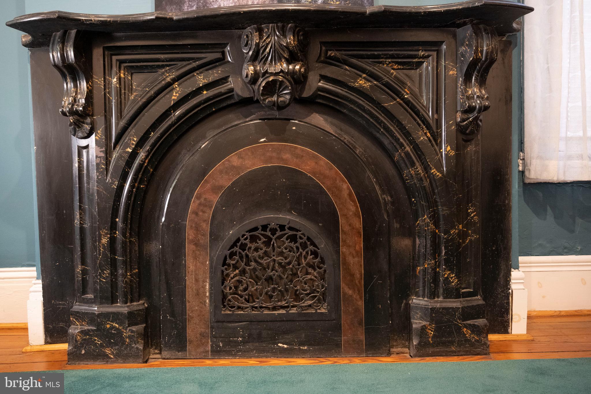 19 South Stricker Street Baltimore, MD 21223 - Photo 18 of 55 a view of walk in closet with clothes and shoes