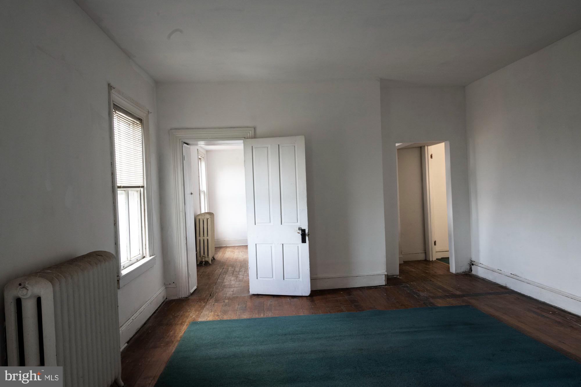 19 South Stricker Street Baltimore, MD 21223 - Photo 48 of 55 a view of an empty room with glass door
