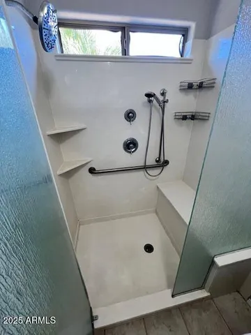 a bathroom with a sink a mirror and a toilet