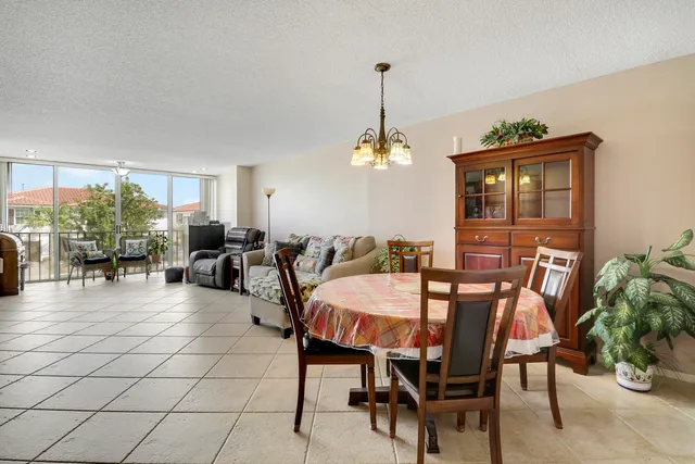 a view of a livingroom with furniture and window
