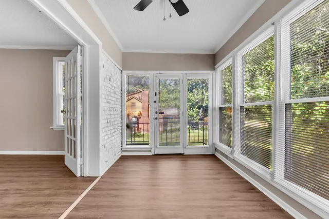 a view of entryway with wooden floor