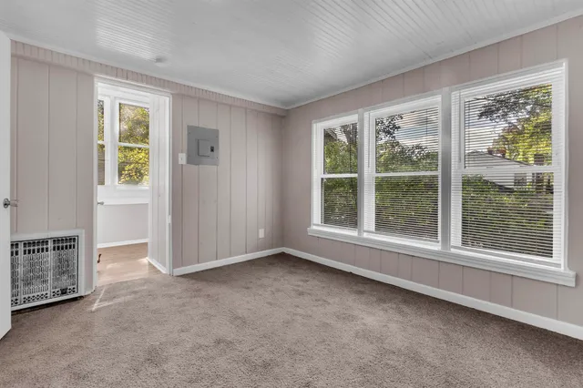 an empty room with windows