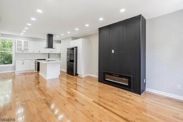 a large bathroom with a sink and a large mirror