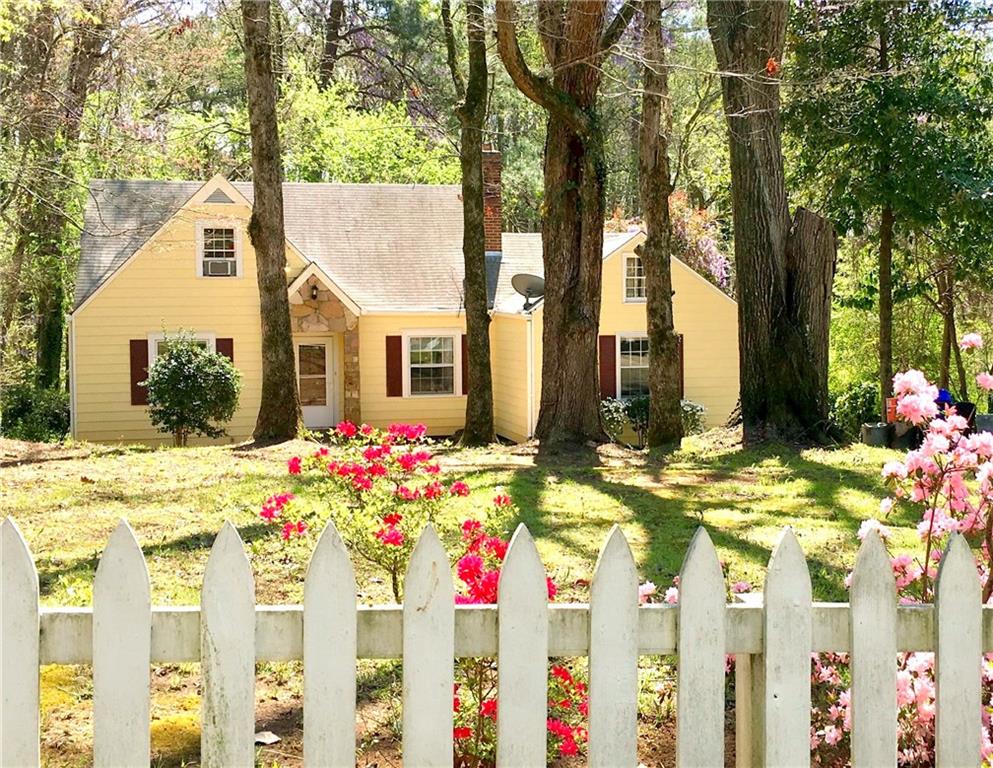 2512 Hogan Road East Point, GA 30344 - Photo 1 of 1 Picket fence infront of the entrance to the home.