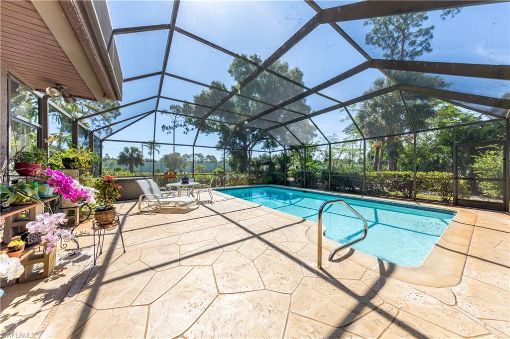632 Hickory Road Naples, FL 34108 - Photo 13 of 20 a view of swimming pool with a patio