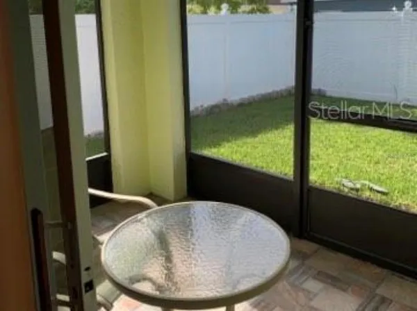 a view of house with backyard