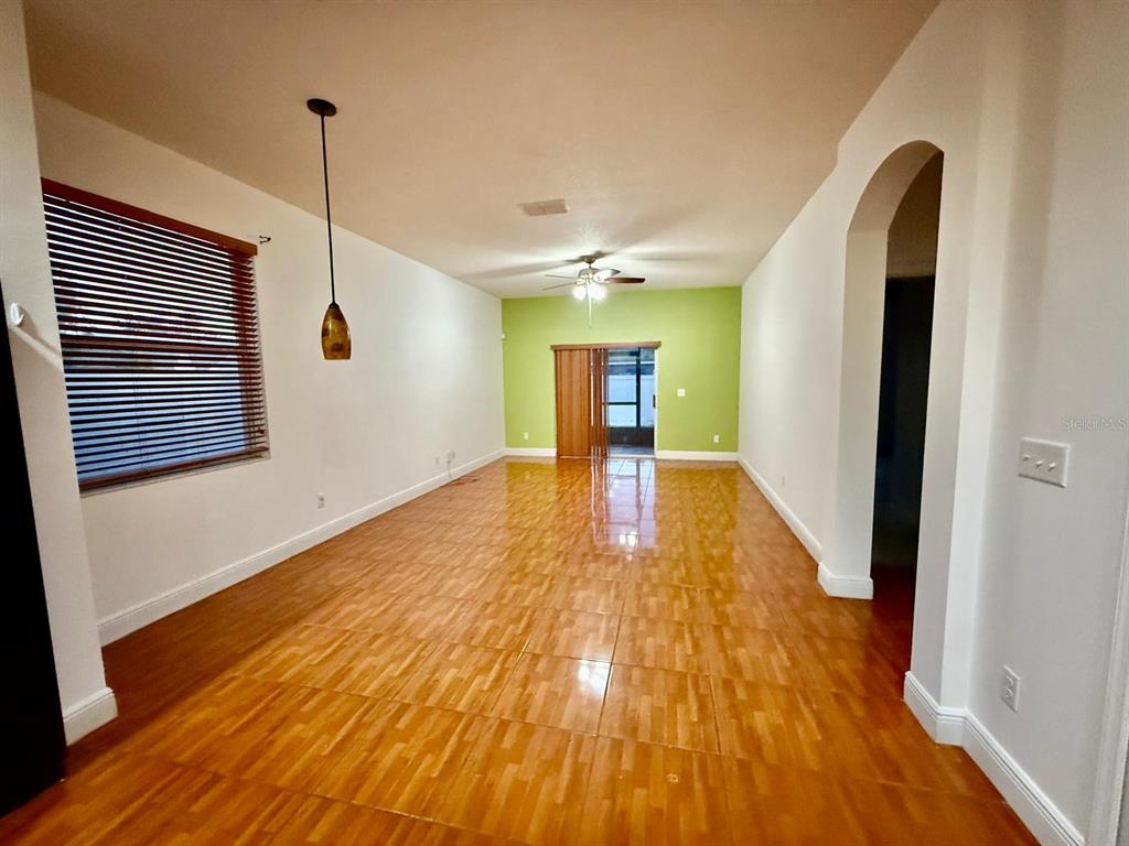 2716 Randal Way Kissimmee, FL 34743 - Photo 2 of 15 a view of an entryway with wooden floor