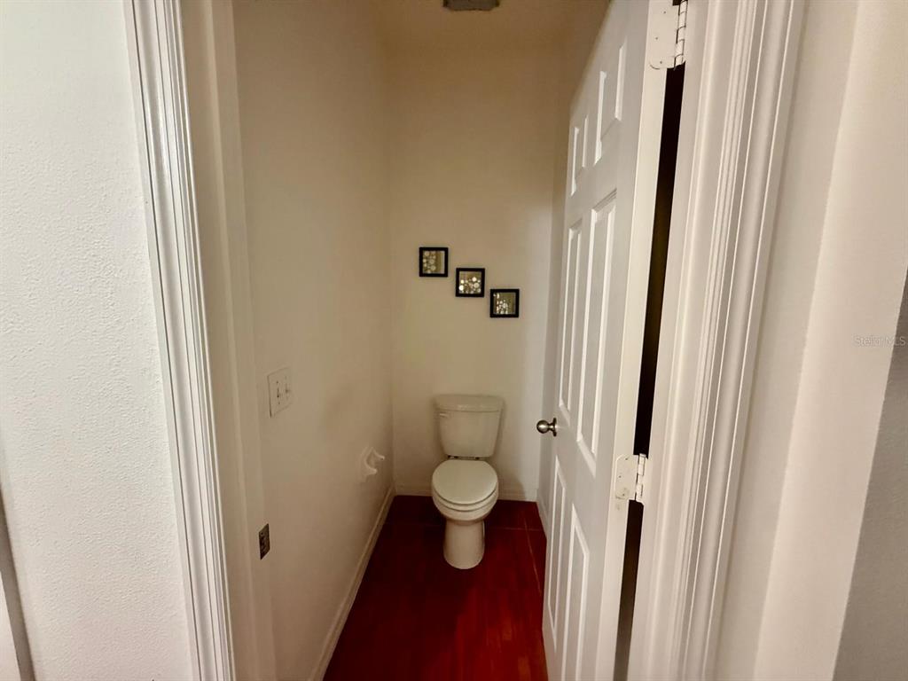 2716 Randal Way Kissimmee, FL 34743 - Photo 10 of 15 a bathroom with a toilet