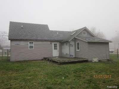 1392 Holmes Road Ypsilanti, MI 48198 - Photo 3 of 14 Back
