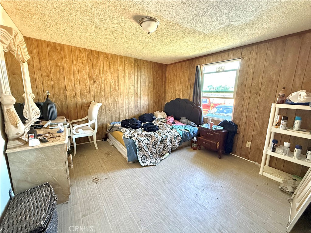 9589 Paramount Road Phelan, CA 92371 - Photo 16 of 29 a living room with furniture and a window