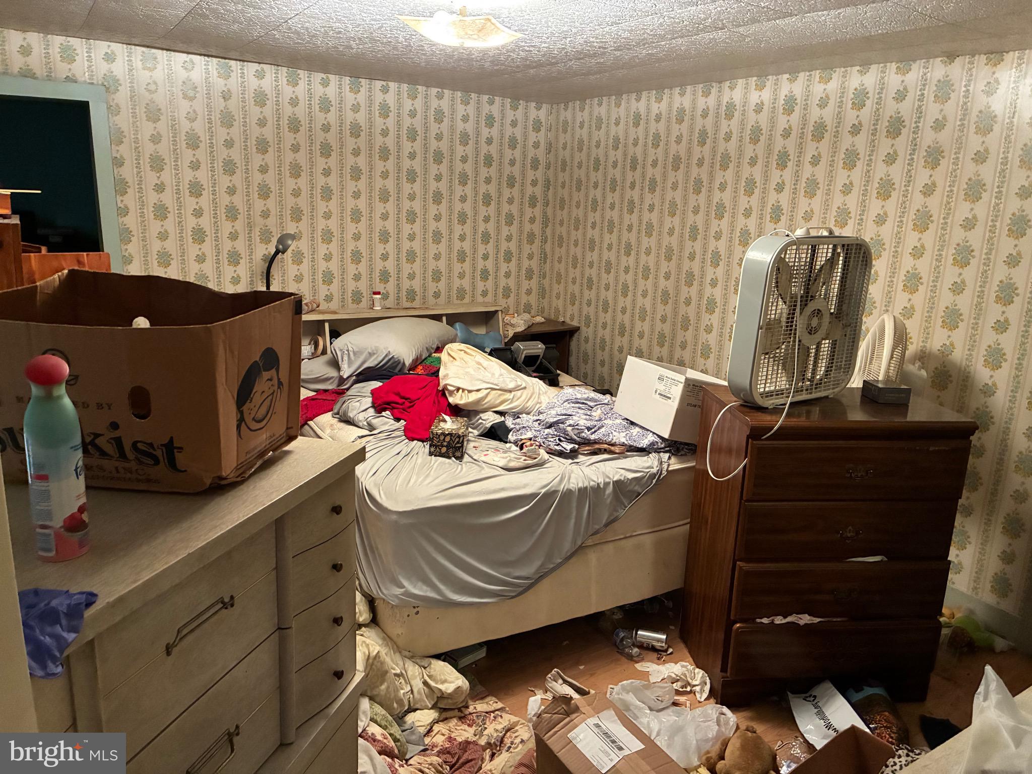 222 Main Street Denver, PA 17517 - Photo 11 of 32 a bedroom with a bed and a mirror