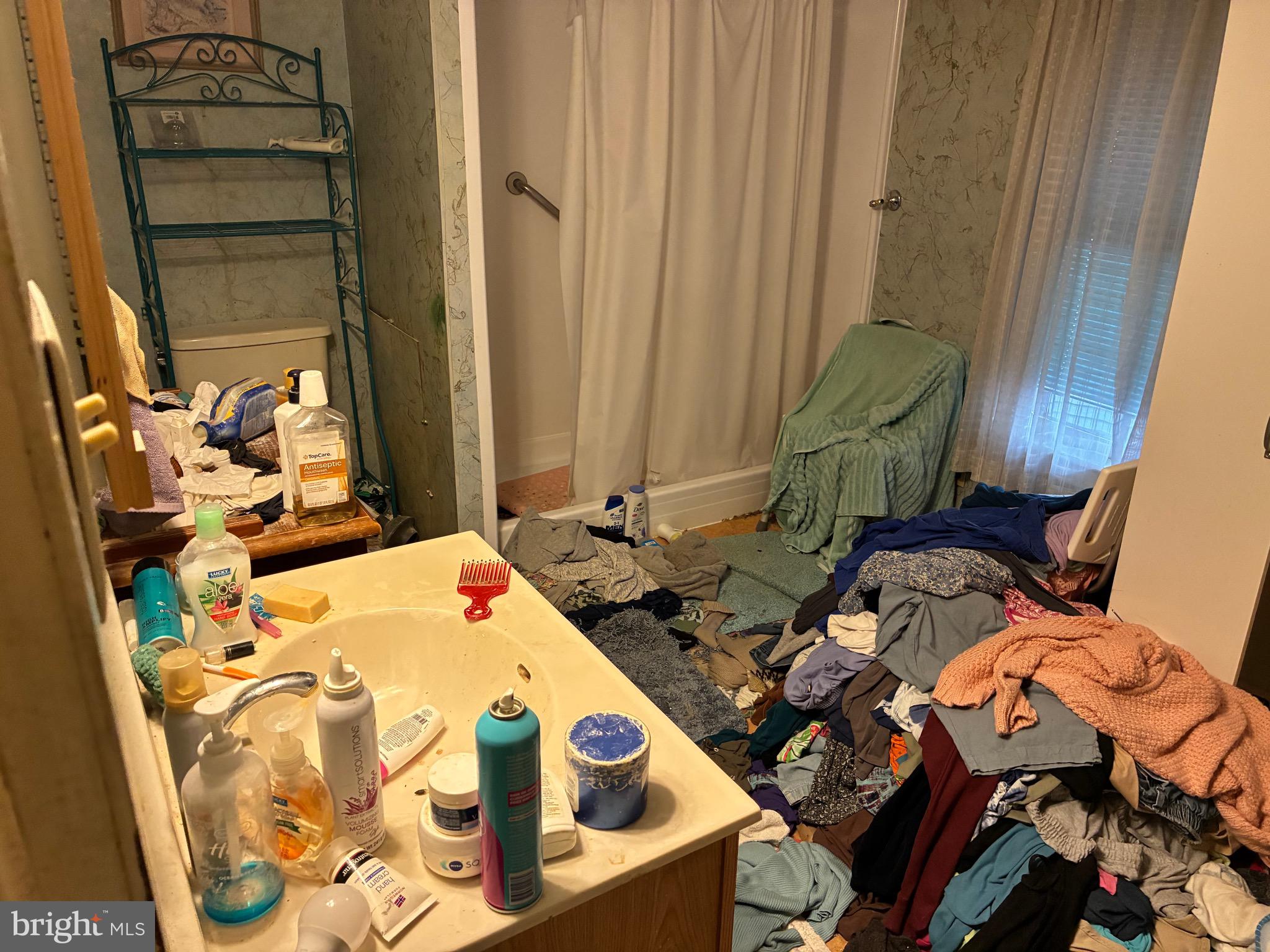 222 Main Street Denver, PA 17517 - Photo 16 of 32 a bed sitting in a bedroom next to a window