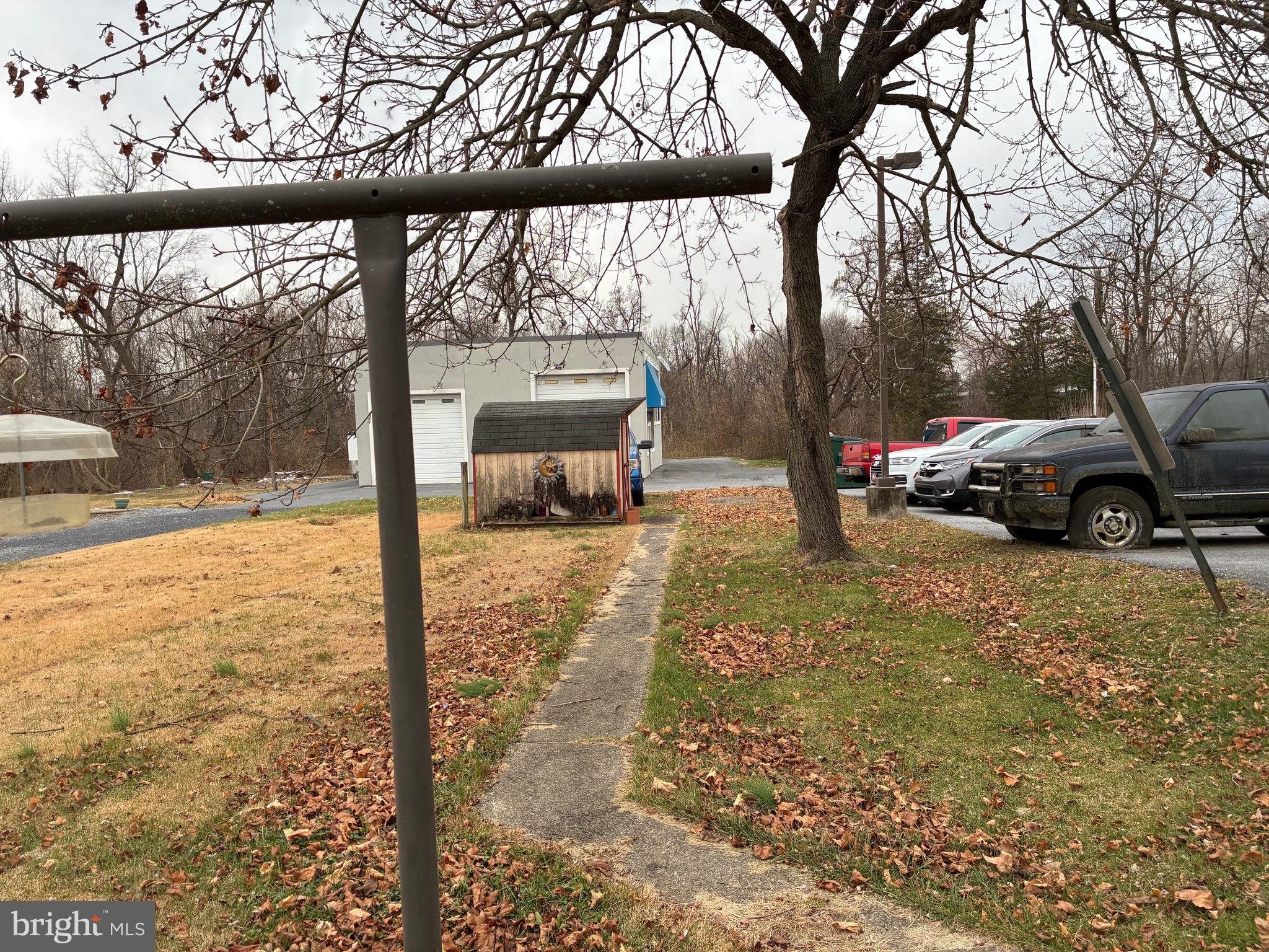 222 Main Street Denver, PA 17517 - Photo 28 of 32 a view of a yard with car parked