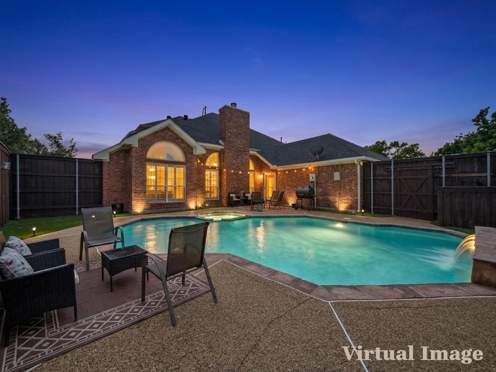 2317 Wellesly Road Rowlett, TX 75089 - Photo 35 of 39 a view of a house with a yard