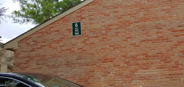 a brick wall with a window