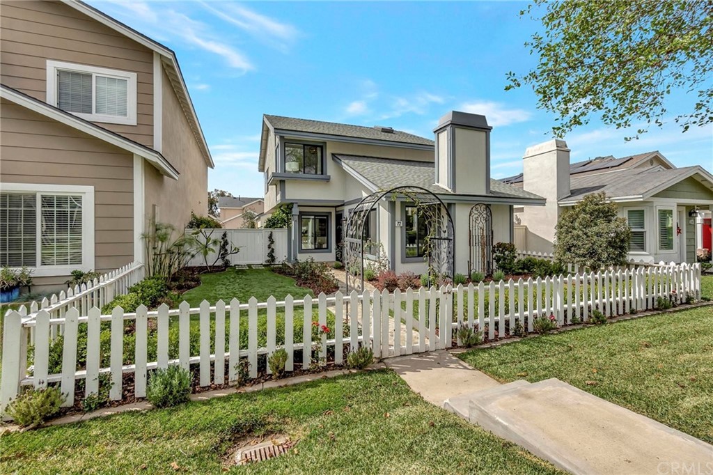 72 Racing Wind Irvine, CA 92614 - Photo 1 of 1 a front view of a house with a yard