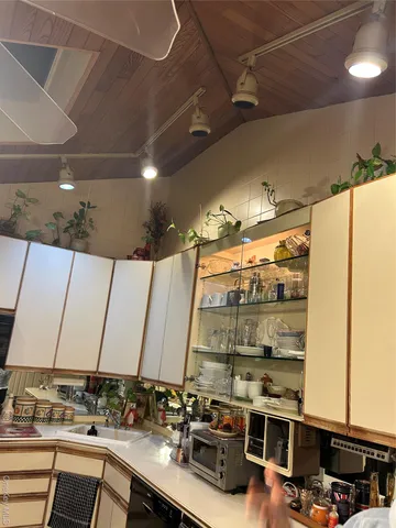 a bathroom with double vanity and a sink