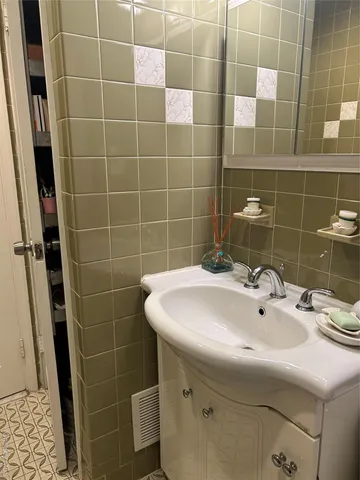 a bathroom with a sink a toilet