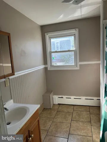 a bathroom with a sink and a toilet
