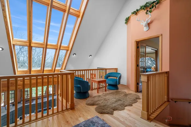 a bedroom with two beds and window