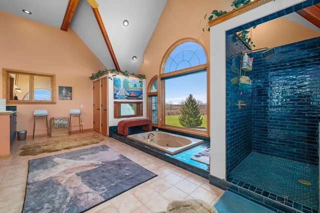 a storage room with lots of wooden furniture and a chandelier