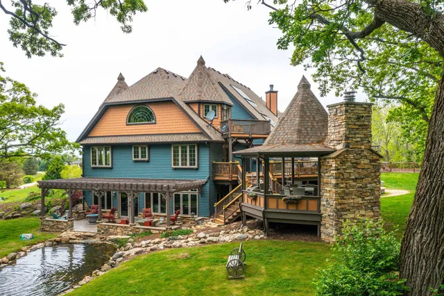 a view of a chairs and table in patio