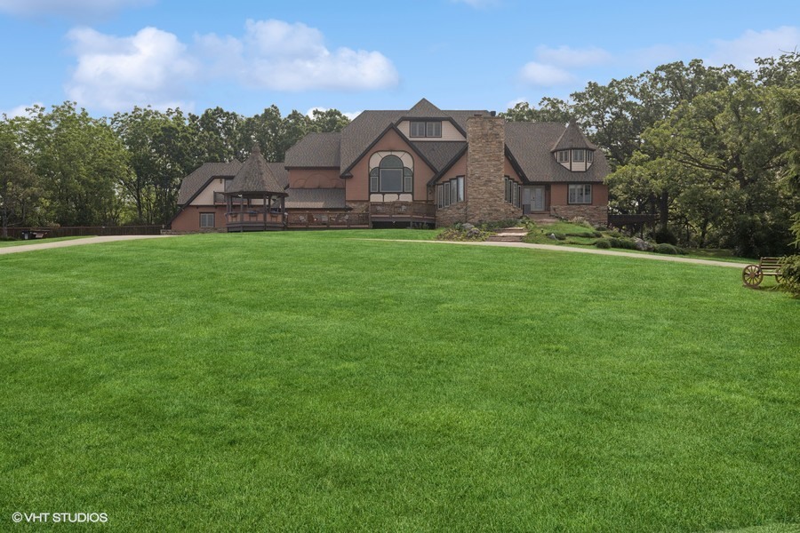 20719 Highview Road Marengo, IL 60152 - Photo 56 of 62 a view of a house with a big yard and large trees