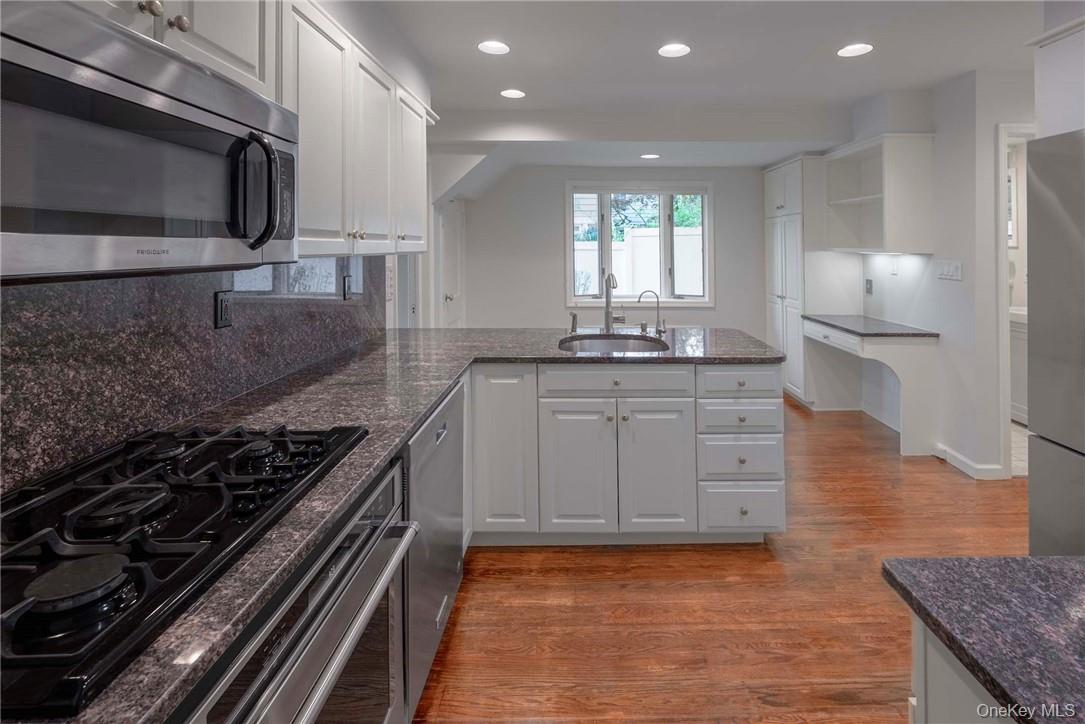 62 Summit Avenue Bronxville, NY 10708 - Photo 10 of 24 kitchen w/dining on opposite side of sink by window