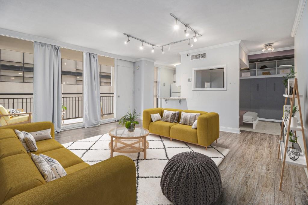 a living room with furniture and a window