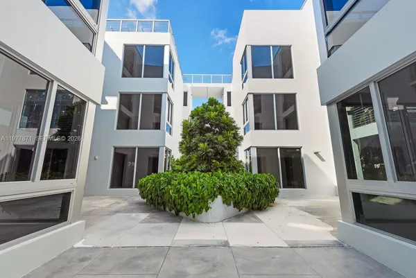 a house with a window and balcony