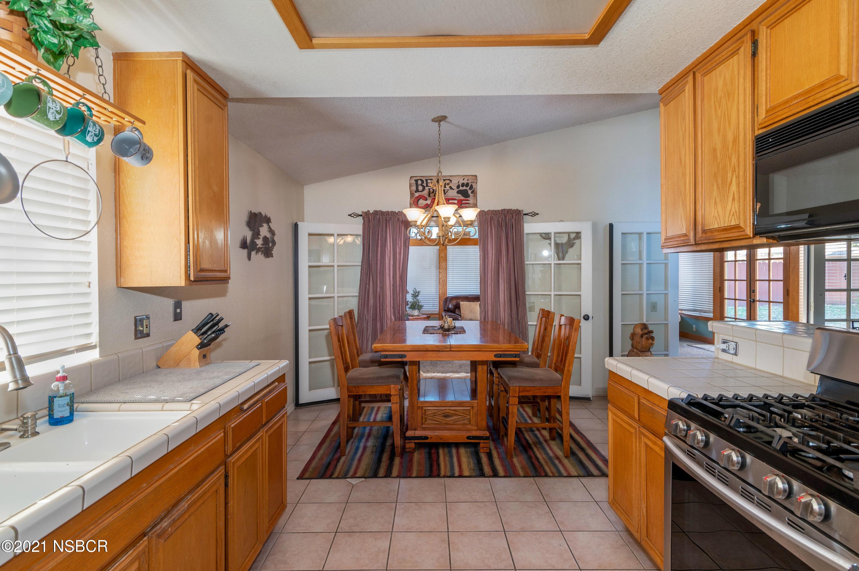 1517 Riverside Drive Lompoc, CA 93436 - Photo 8 of 21 008_KITCHEN AND DINING ROOM