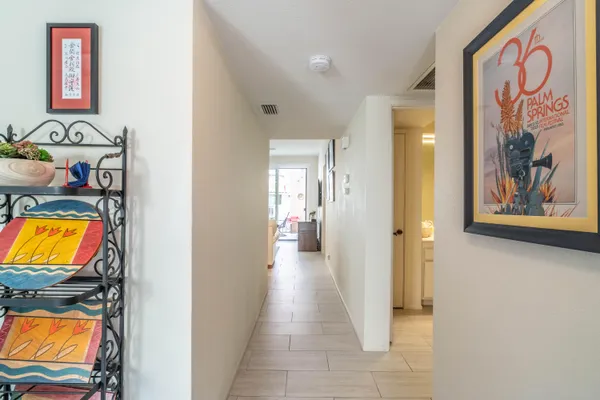 a view of a bedroom from a hallway