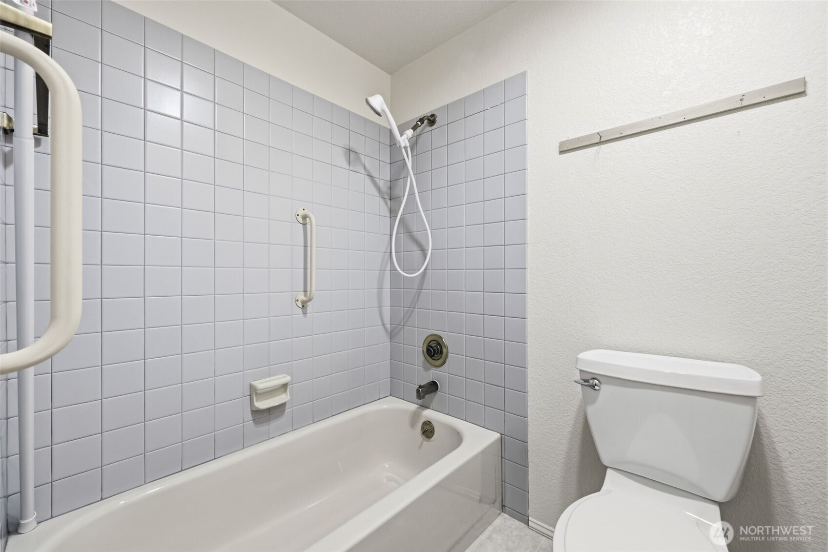 7904 53rd Street West University Place, WA 98467 - Photo 22 of 29 a bathroom with a toilet and shower