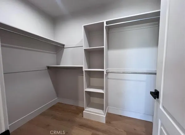 a view of an empty walk in closet