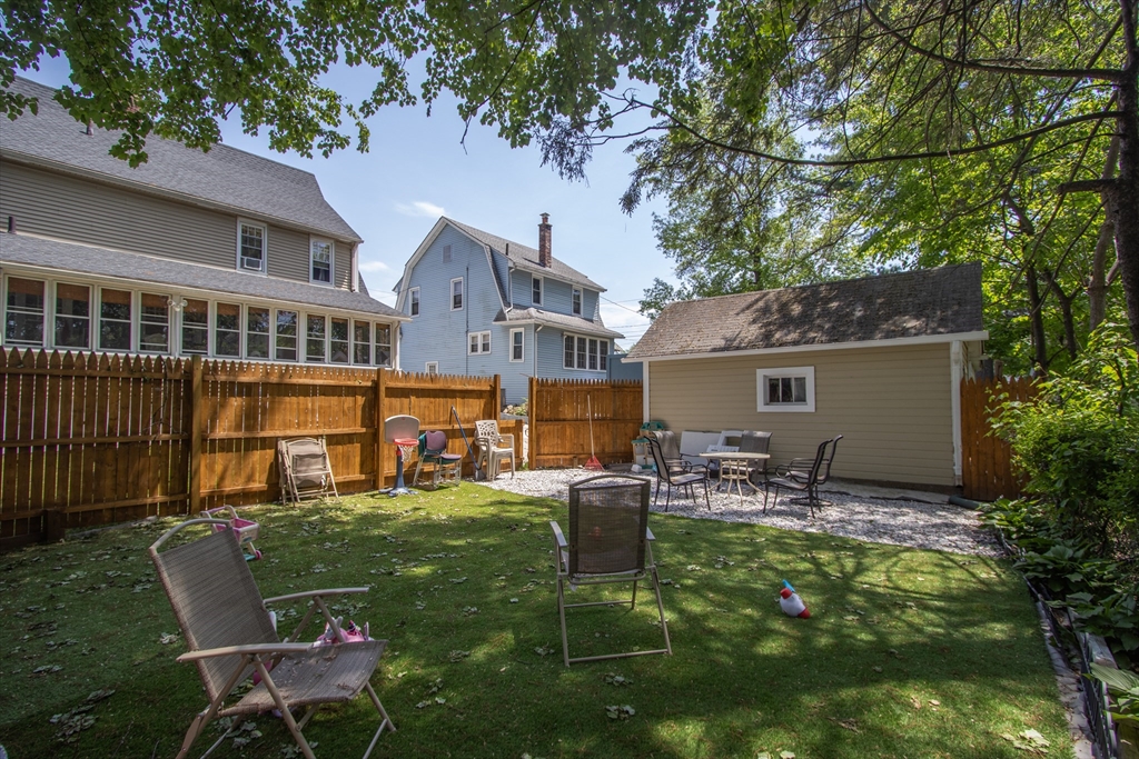34 Preston Street Springfield, MA 01109 - Photo 34 of 34 a house view with outdoor seating space and garden