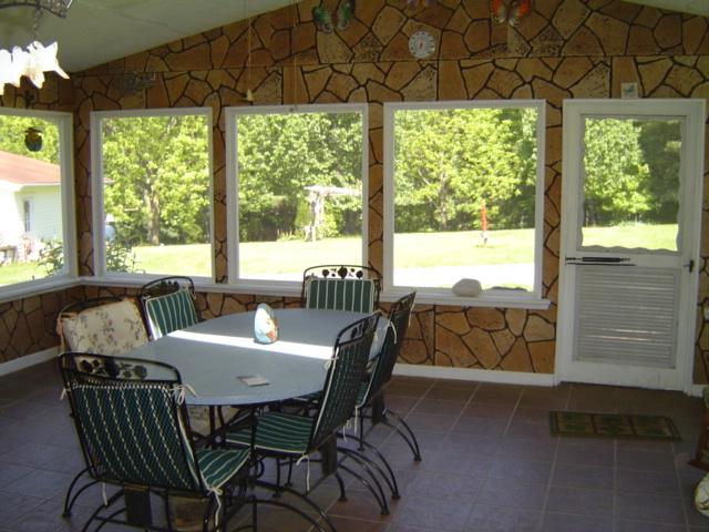 1370 Johnny's Ridge Road Ferrum, VA 24088 - Photo 11 of 24 a view of a dining room with furniture window and outside view