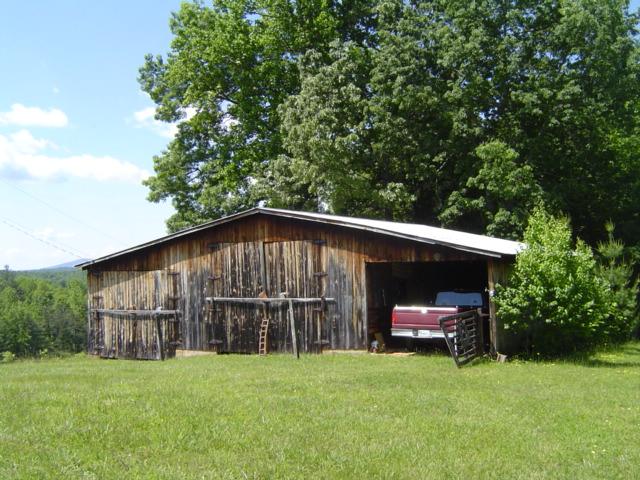 1370 Johnny's Ridge Road Ferrum, VA 24088 - Photo 16 of 24 a view of front of house with a yard