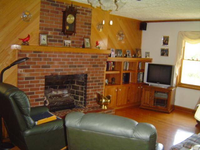 1370 Johnny's Ridge Road Ferrum, VA 24088 - Photo 4 of 24 a living room with furniture and a flat screen tv