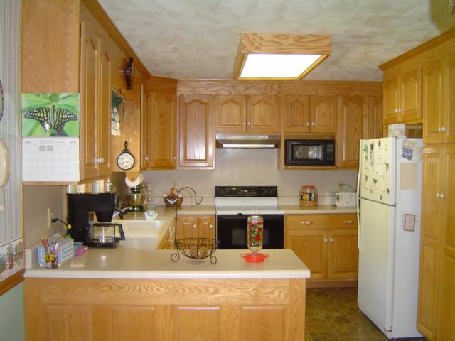 1370 Johnny's Ridge Road Ferrum, VA 24088 - Photo 5 of 24 a kitchen with a sink appliances and cabinets