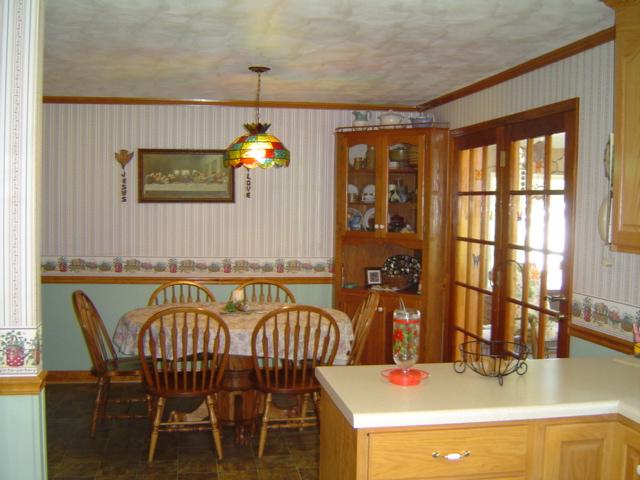 1370 Johnny's Ridge Road Ferrum, VA 24088 - Photo 6 of 24 a dining room with a table and chairs