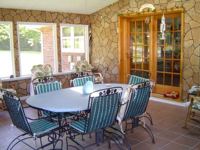 1370 Johnny's Ridge Road Ferrum, VA 24088 - Photo 10 of 24 a view of a dining room with furniture and wooden floor