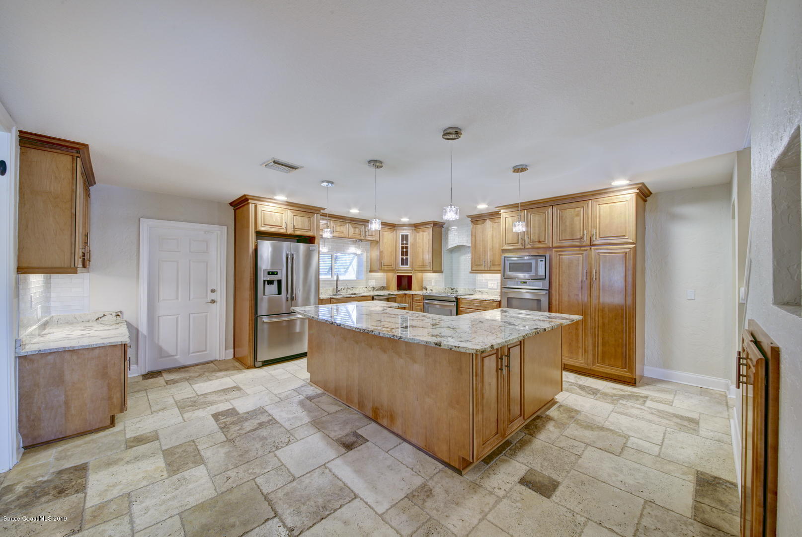 5725 Lake Washington Road Melbourne, FL 32934 - Photo 12 of 72 Kitchen with Island