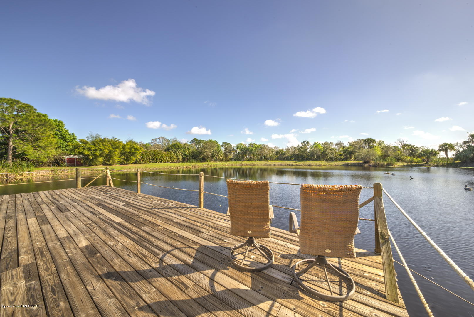5725 Lake Washington Road Melbourne, FL 32934 - Photo 4 of 72 Sitting on the Dock